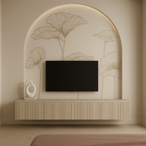 Floating fluted beige TV unit with matte wood finish set inside an arched wall niche featuring soft floral mural and cove lighting.