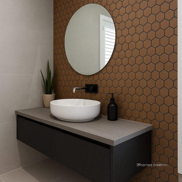 Modern bathroom setup featuring matte black cabinet, ceramic basin, and geometric wall tiles