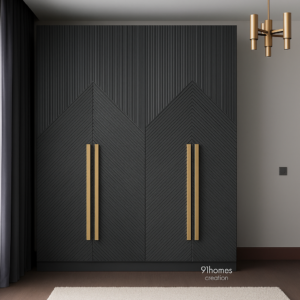 Dark grey chevron wardrobe with brass handles and chevron grooves