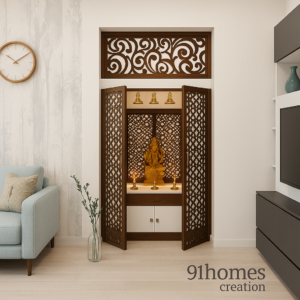 Compact jaali mandir in white walnut finish, set in a recessed niche with a golden Ganesha statue.