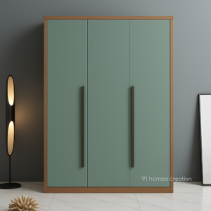 Sage green matte wardrobe with long handles and wood frame