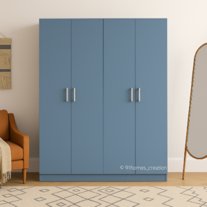Dusty blue matte wardrobe with short silver handles in modern setting