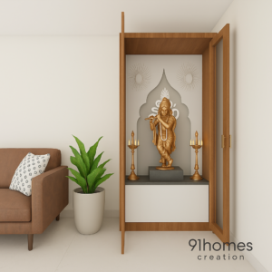 Modern wooden pooja unit with golden statue, recessed niche, and oil lamps