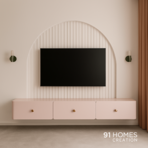 pink arched panel tv unit with matte finish and fluted wall