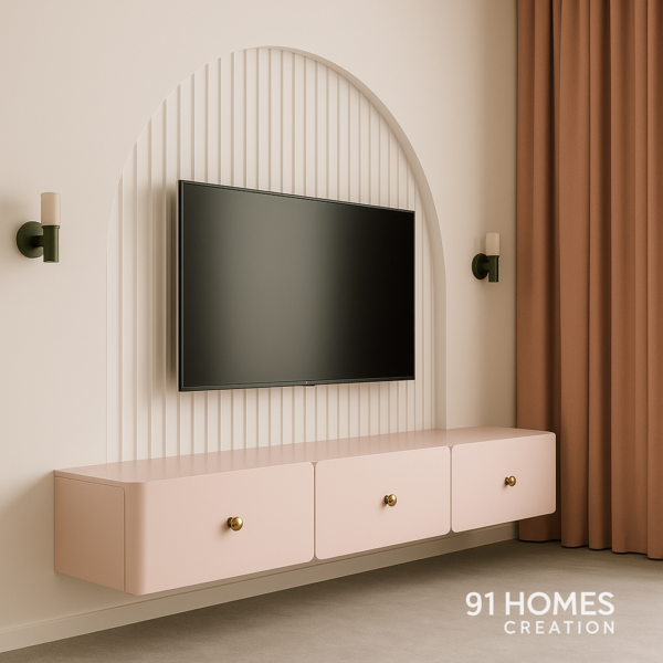 pink arched panel tv unit with gold knobs and rounded corners