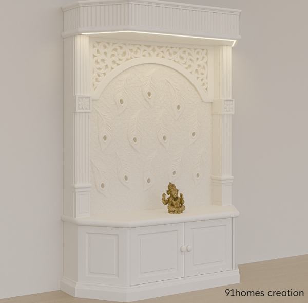 Side angle of elegant matte white puja unit with brass Ganesha idol.