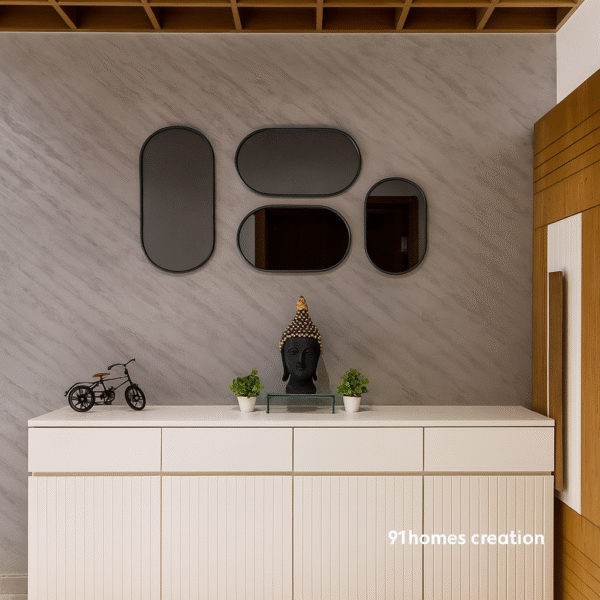 Cream console foyer unit with grey marble textured wall and decorative mirrors