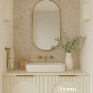 Beige bathroom vanity with arched mirror, fluted cabinet doors, and brass fixtures.